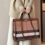 Designer Leather Tote: Trendy & Spacious Women's Shoulder Bag - Julie bags